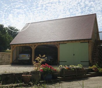 Oak carport and garage in Worcester by Radnor Oak