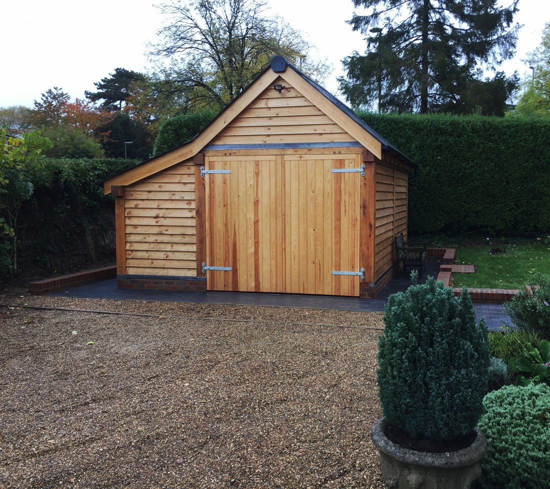 Secure oak framed garage with a side store in Surrey-